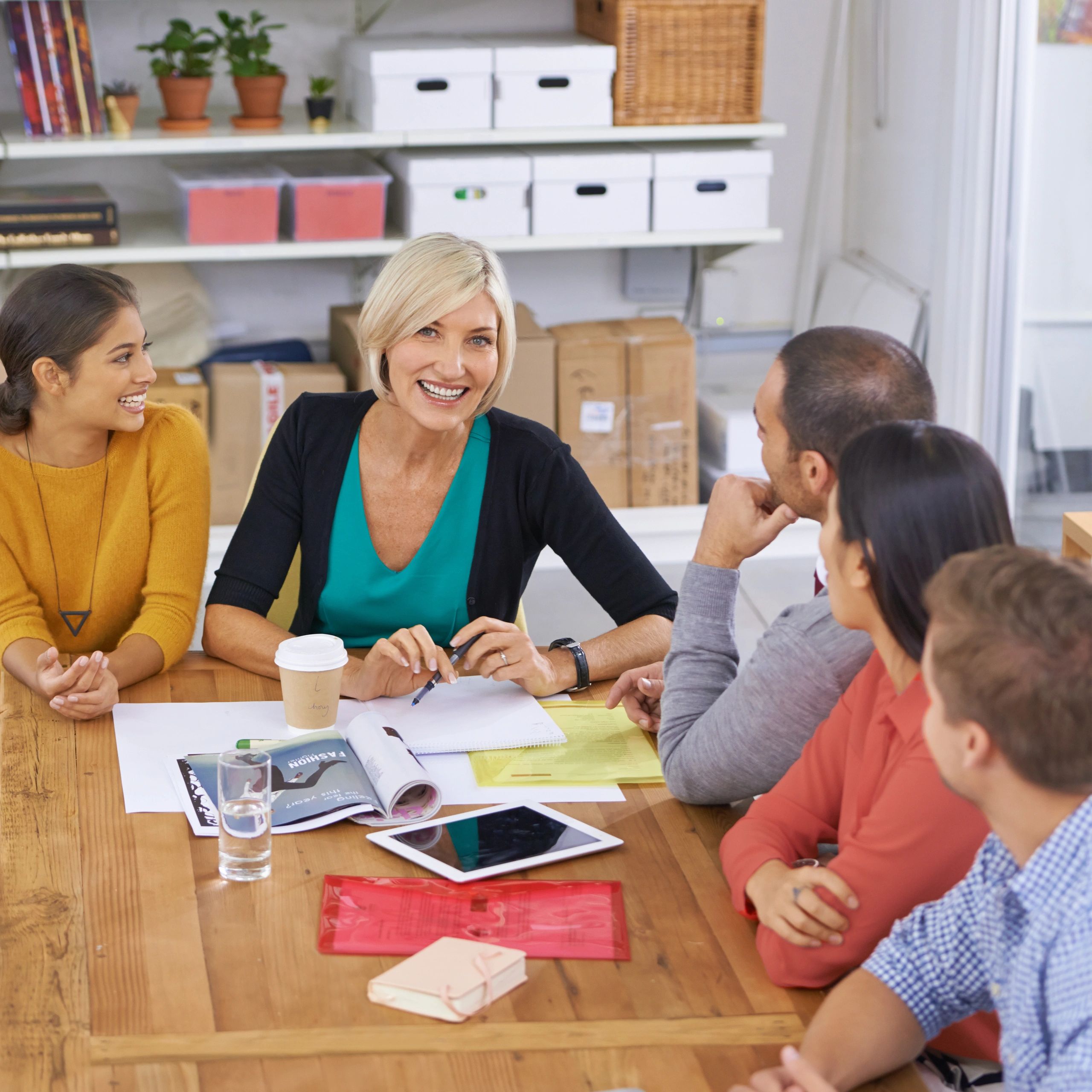 Colleagues collaborating around a table