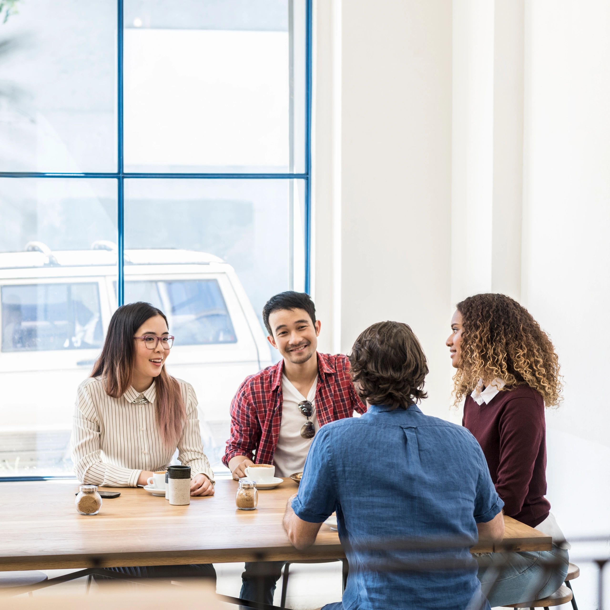 Colleagues talking during a break